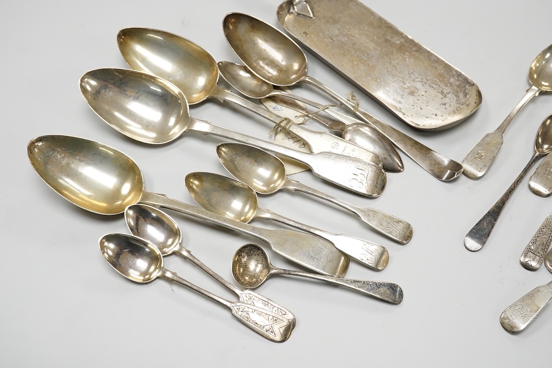 A small quantity of assorted mainly 19th century silver flatware including table spoons and teaspoons, various dates, patterns and makers, together with a silver crumb scoop(lacking handle), five 19th century Russian 94